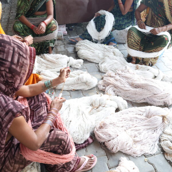 Soft, natural wool fibers used in the production of premium handcrafted rugs at Ramsha Carpets
