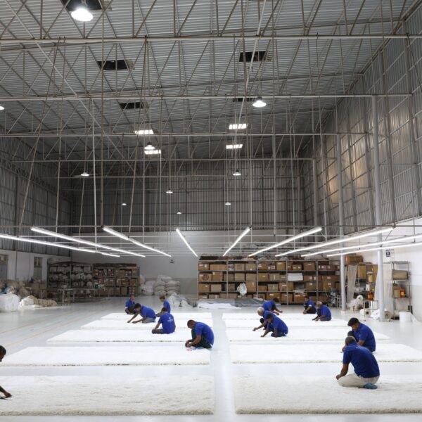 Close-up of premium shaggy rug finishing showing thick, soft pile and expert craftsmanship by Ramsha Carpets