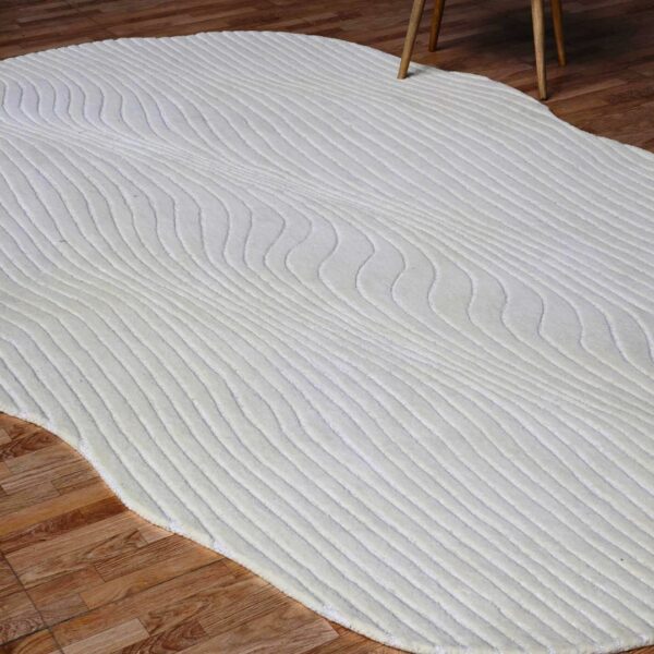 Handcrafted custom rug by Ramsha Carpets, featuring detailed craftsmanship and luxurious natural fibers for sophisticated interiors.