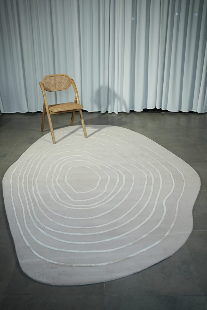 Custom rug designed with faded vintage patterns and a distressed finish for timeless elegance