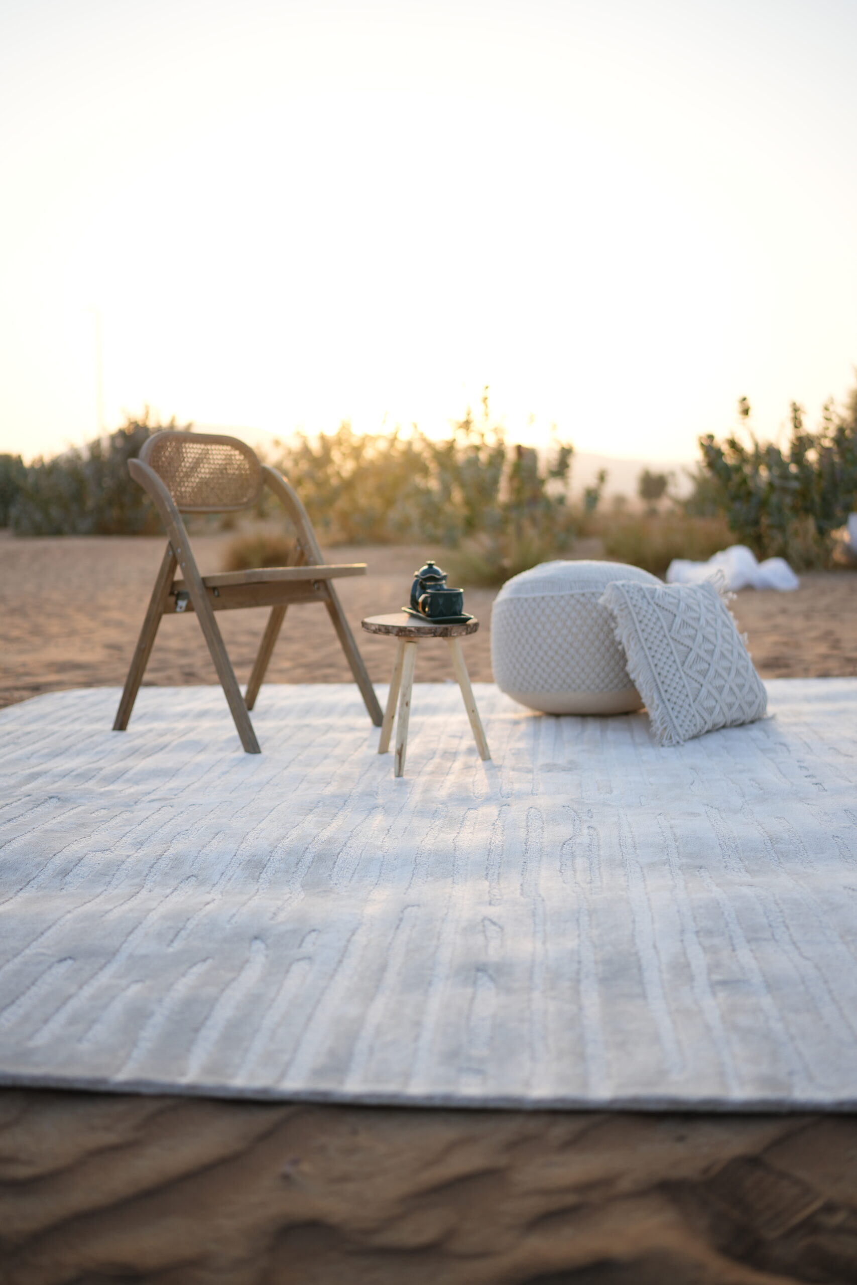 Custom-designed rug with abstract patterns styled in a high-end lounge by Ramsha Carpets