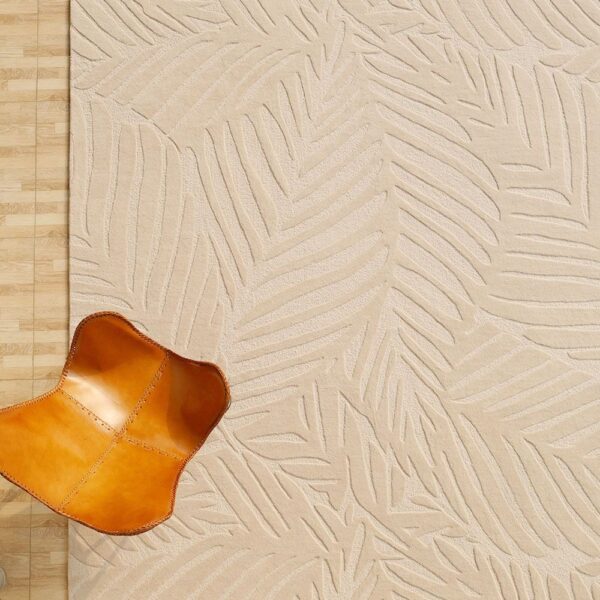 Custom hand-tufted rug with intricate patterns, handcrafted by Ramsha Carpets using premium materials.