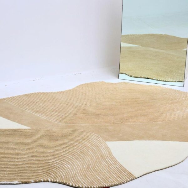 Artisan-crafted custom rug by Ramsha Carpets, featuring intricate designs and high-quality natural fibers for luxurious interiors.