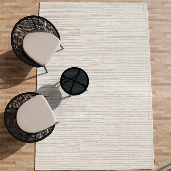 Artisan-crafted custom rug by Ramsha Carpets, showcasing detailed patterns and high-quality materials for bespoke interiors.