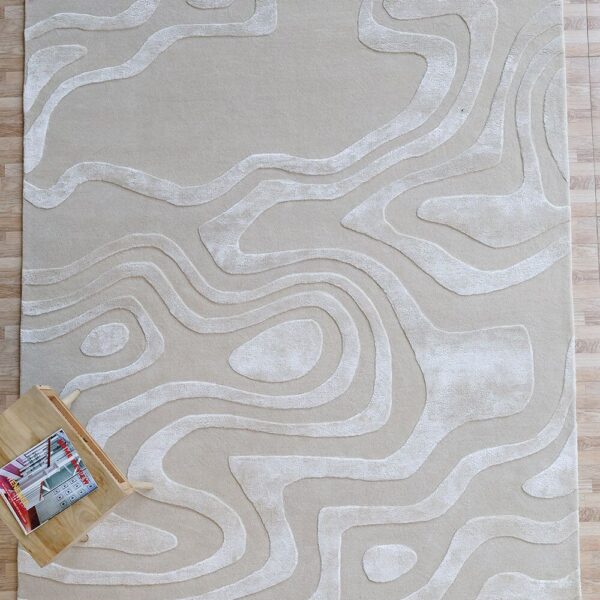 Custom textured neutral-tone rug by Ramsha Carpets, handcrafted for modern interiors with subtle elegance and soft texture.