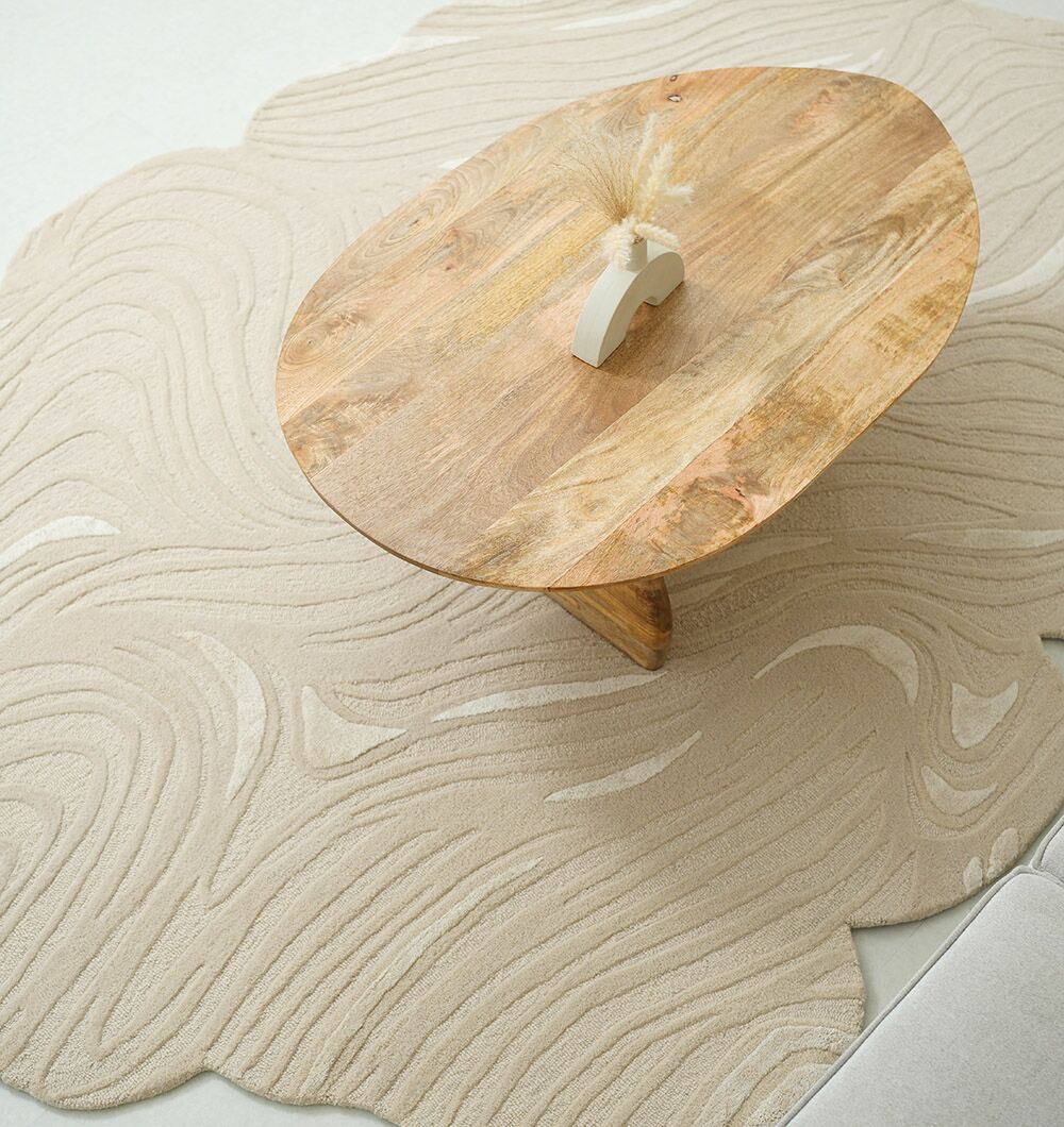 Budget vs Luxury Rugs Custom rug designed with boho patterns and soft textures for relaxed interiors