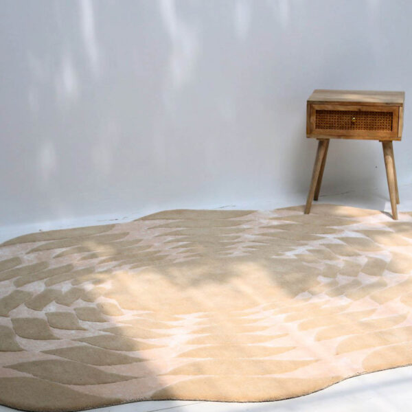 Custom handmade rug with intricate patterns in warm earth tones, crafted by expert artisans at Ramsha Carpets.