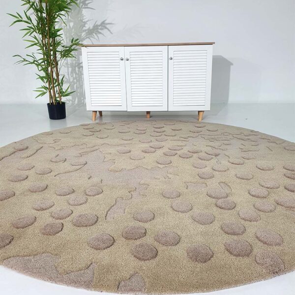 Handmade shaped rug Dubai,Artisanal curved rug UAE,Custom-shaped wool carpet Sculptural handmade floor art,Unique rugs for Dubai homes,Designer rugs UAE Eco-friendly rugs Dubai Organic-shaped area rugs Boho modern interior décor,Luxury rug delivery in UAE