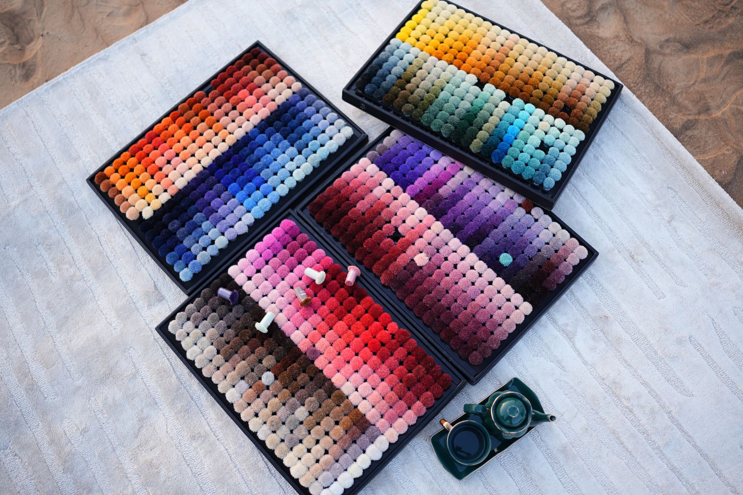 Custom-designed rug with abstract patterns styled in a high-end lounge by Ramsha Carpets