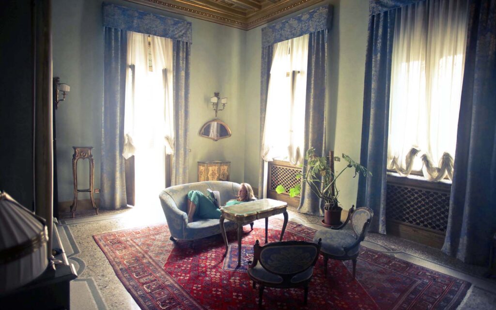 Bespoke custom rug with modern geometric design styled in a luxury interior by Ramsha Carpets