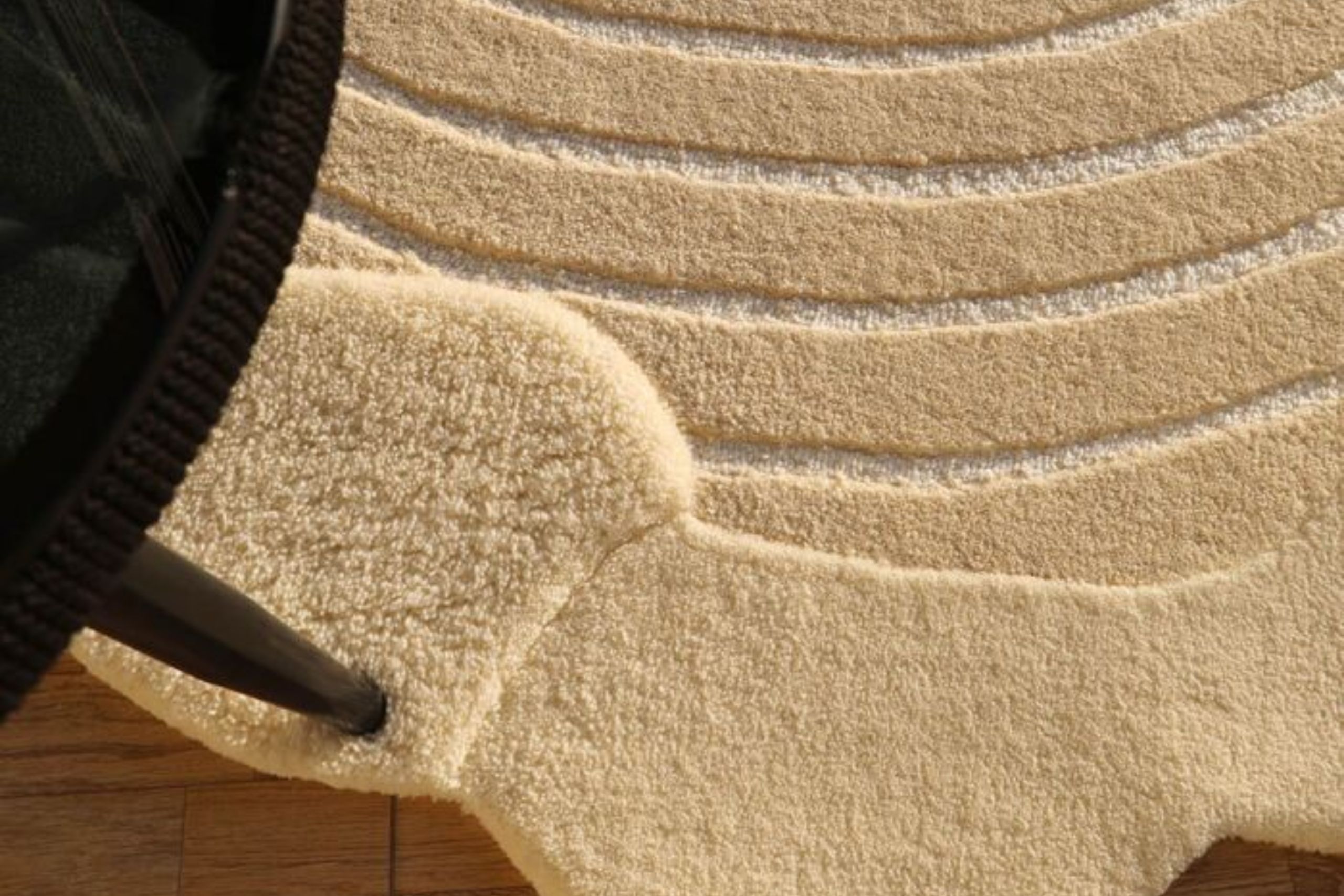 Custom rug hand-dyed in soft gradient tones for a luxurious interior look