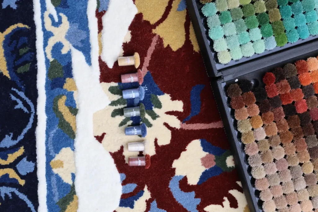 Artisan crafting bespoke handmade carpets at Ramsha Carpets workshop