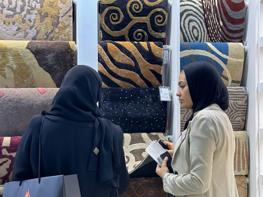 Spacious and elegant Ramsha Carpets showroom displaying a wide variety of custom rugs and carpets